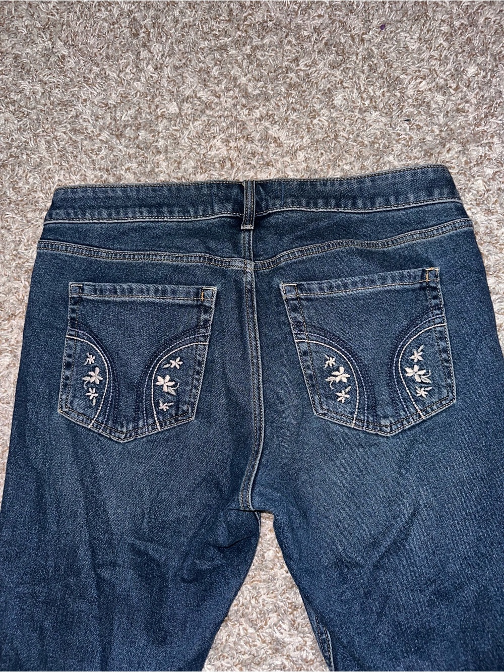 Hollister Indigo Low-Rise Jeans with White Floral Pocket Embroidery